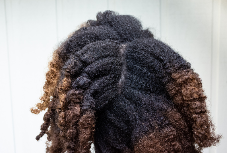 Black woman high medium low porosity hair
